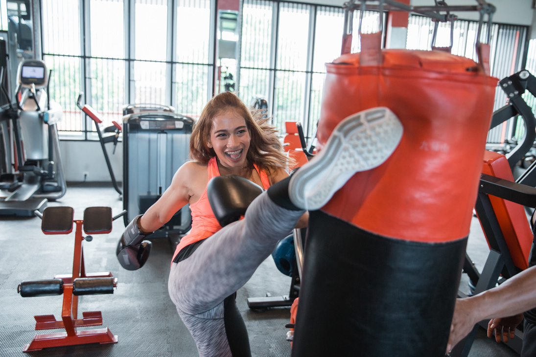 Kickboxing Woman Punching Kicking