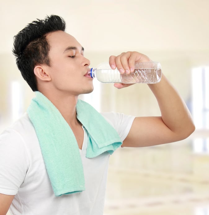 Fitness Man Drinking Water